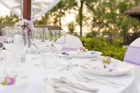 Romantic dinner setting at the beachの写真素材