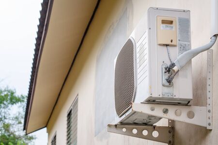 air conditioners installation outside the wallの写真素材