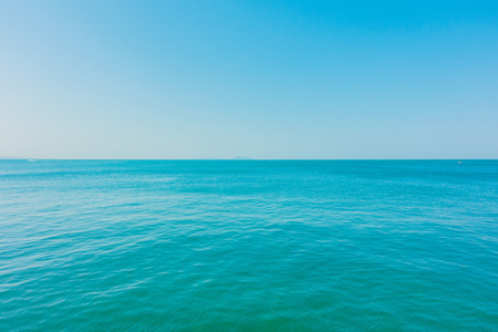 Calm Sea Ocean And Blue Clear Sky Background.の写真素材