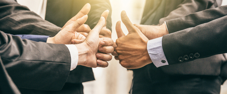 Business people group of hands making give thumbs up sign teamwork Join Hands Support Together successful Concept.の写真素材