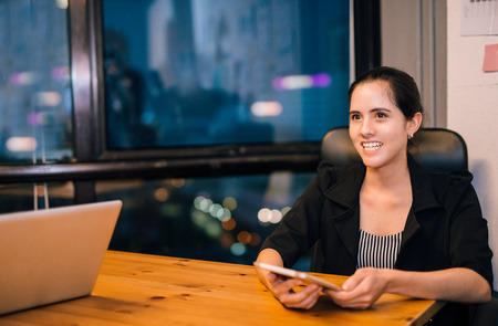 Business woman smile portrait hold phoneの写真素材