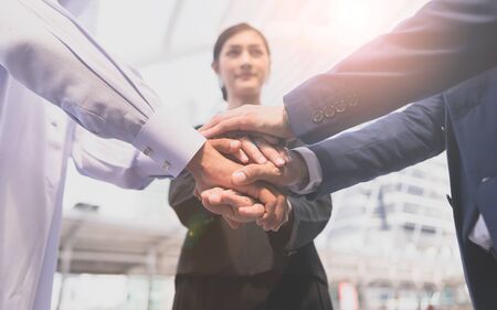Stack hand. Business teamwork join hands support together and dedicated Conceptの写真素材