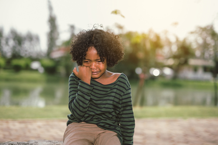 little African american boy cryingの写真素材
