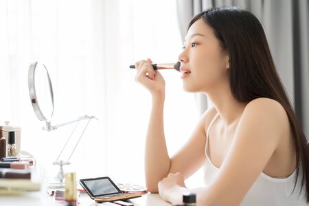 Young Asian female makeup beauty by Makeup Brushの写真素材