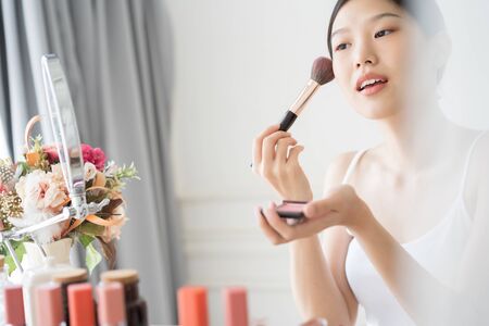 Young Asian female makeup beauty by Makeup Brushの写真素材