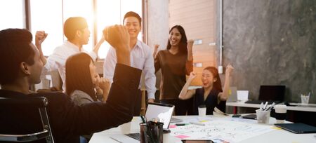 Group of Asian team creative business people Happy to be successful partnership teamwork conceptの写真素材