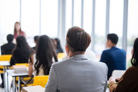 large group in seminar class room to agree with speaker at conference seminar meeting roomの写真素材