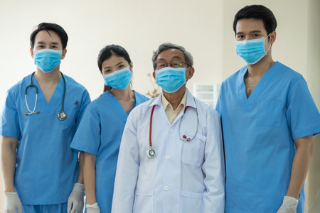 Portrait team Asian Doctors with face masks
