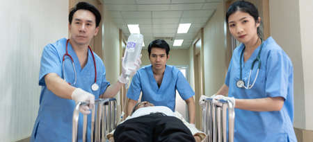 Asian Doctors and nurses are transporting emergency patients to the emergency room.の写真素材