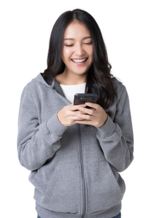 Young Asian woman texting message using mobile phone application on Isolate die cut on transparent backgroundの写真素材