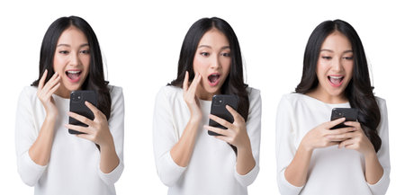 Pretty Asian woman looking at smartphone screen feeling surprise Isolate die cut on transparent...