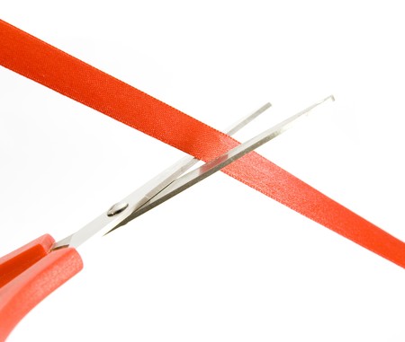 cutting ribbon with scissors