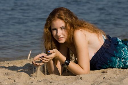 pretty girl on the beachの写真素材