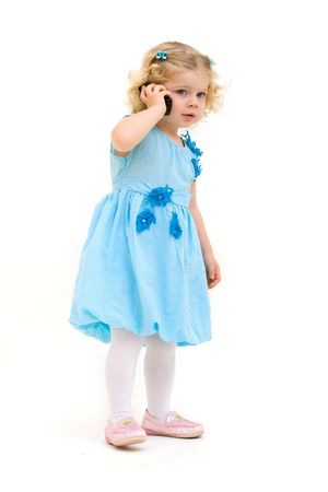 little child with phone isolatedの写真素材