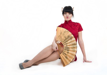 portrait of girl in geisha costume isolated on whiteの写真素材