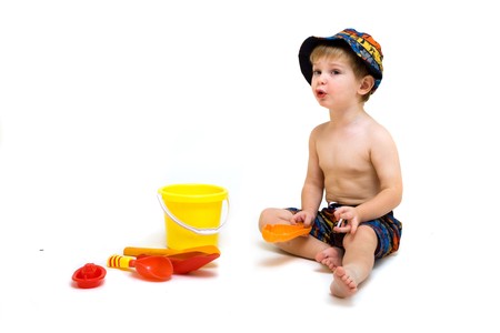 portrait of cute little playful boy isolated on whiteの写真素材
