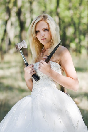 portrait of young beautiful bride in summer outdoorの写真素材