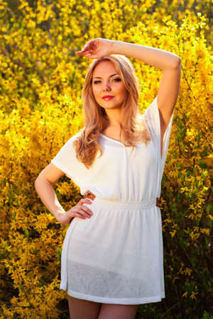 beautuful blond woman on meadowの写真素材