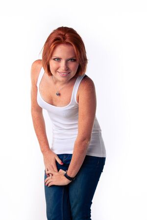 cute model in studio with red hairの写真素材
