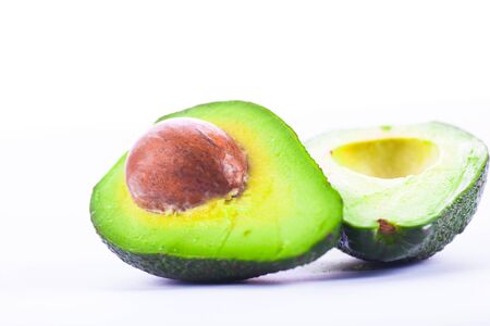 Fresh avocado fruit isolated over white backgroundの写真素材