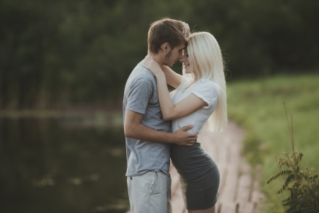 portrait of young couple in love outdoorsの写真素材