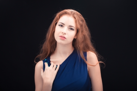 Beautiful woman with curly long hairの写真素材