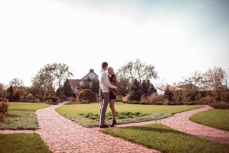 happy young couple in love outdoor in autumnの写真素材