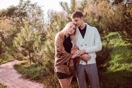 happy young couple in love outdoor in autumnの写真素材