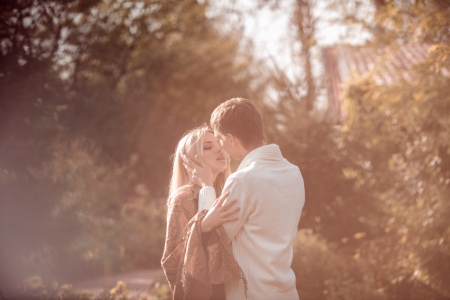 happy young couple in love outdoor in autumnの写真素材