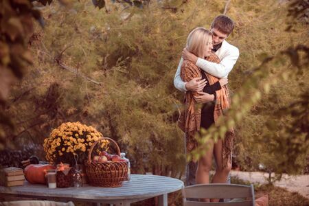 happy young couple in love outdoor in autumnの写真素材