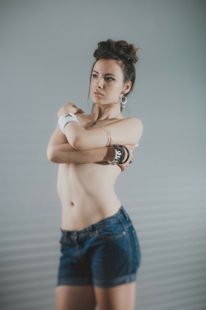 Sensual sexy woman posing topless