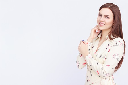 Portrait of thinking woman on isolated backgroundの写真素材