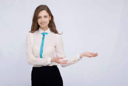 Portrait of businesswoman palms up on isolated backgroundの写真素材