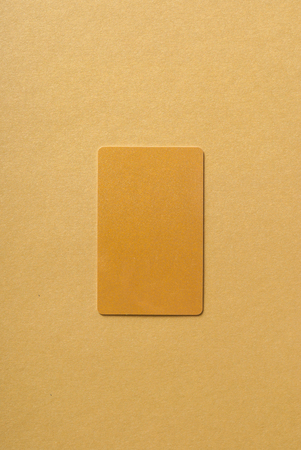 Presenting business card on brown desk with advertisment