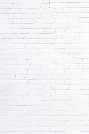 Abstract weathered texture stained old stucco light gray and aged paint white brick wall background in rural room, grungy rusty blocks of stonework technology color horizontal architecture wallpaperの写真素材