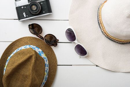 Beach accessories on wooden board. Summer vacationの写真素材