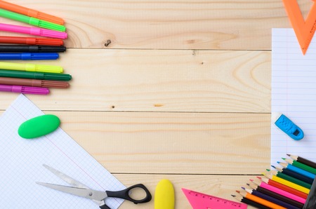 School and office supplies frame, on wooden background, back to schoolの写真素材