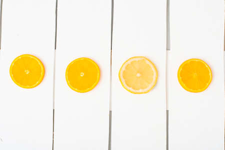 Colorful citrus fruits on the rustic white background. Flat lay.の写真素材