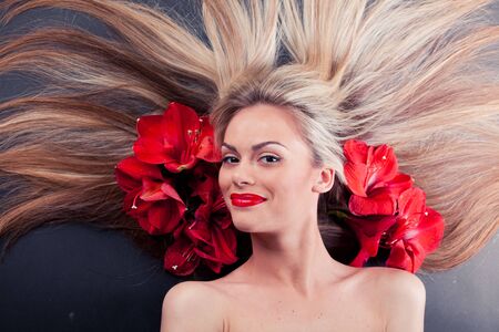 Beautiful Sexy Young Woman with flowerの写真素材