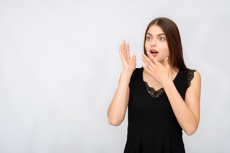 portrait of beautiful girl in black dressの写真素材