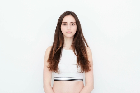 Young casual woman style isolated over white background. studio portrait,の写真素材