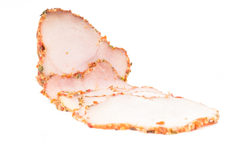 Sliced ham isolated on whiteの写真素材