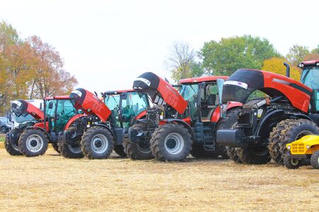 Agricultural machinery. Tractor, standing in a rowの写真素材