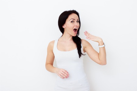 Surprised happy beautiful woman in excitement.の写真素材