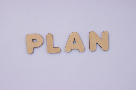 words from wooden letters on light grey backgroundの写真素材