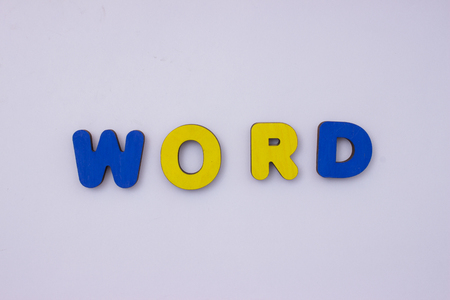 Word World from wooden letters on light grey background.の写真素材