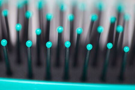Macro view of hairbrush. Comb closeupの写真素材