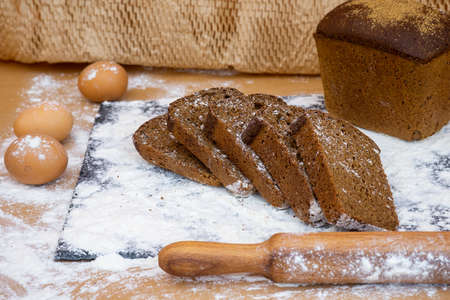 Grain baked brean on wooden boardの写真素材