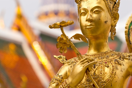 golden statue in Grand Palace Bangkok Thailand の写真素材