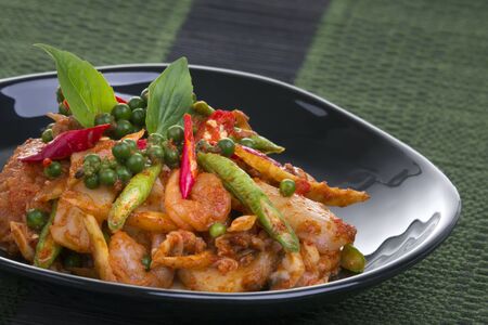 Fried herb vegetables with seafood, Thai foodの写真素材